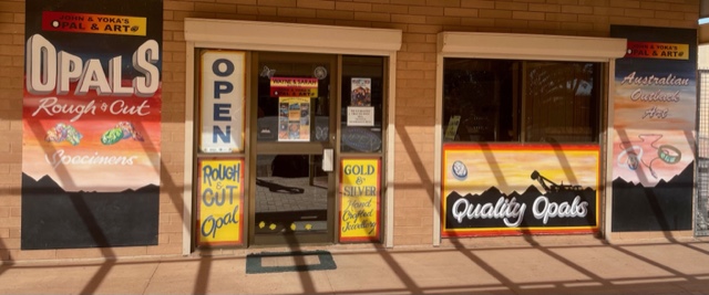 New owners Wayne and Sarah Rethus took over the business on the 1st August 2023 from John and Yoka Dunstan. We are opal miners and Aussie family living our dream in Coober Pedy. Our shop has some rough opal from time to time, handcrafted opal jewellery, opal specimens, local Zebra rock and Australian outback local indigenous art. Come in and say G'day!